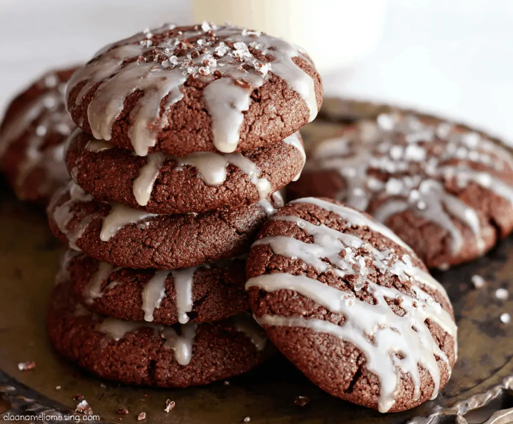 Delicious glazed chocolate gingerbread cookies with shiny glaze and festive decoration