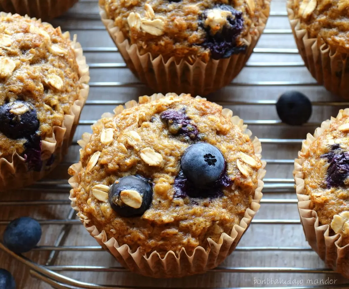 Healthy Banana Blueberry Oatmeal Muffins in a baking tray, perfect for breakfast or snack
