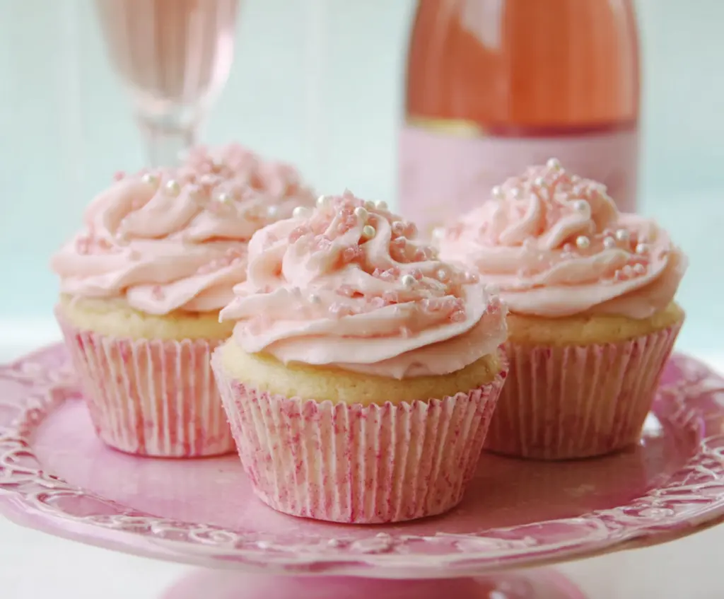Delicious pink champagne cupcakes topped with elegant frosting for a festive celebration