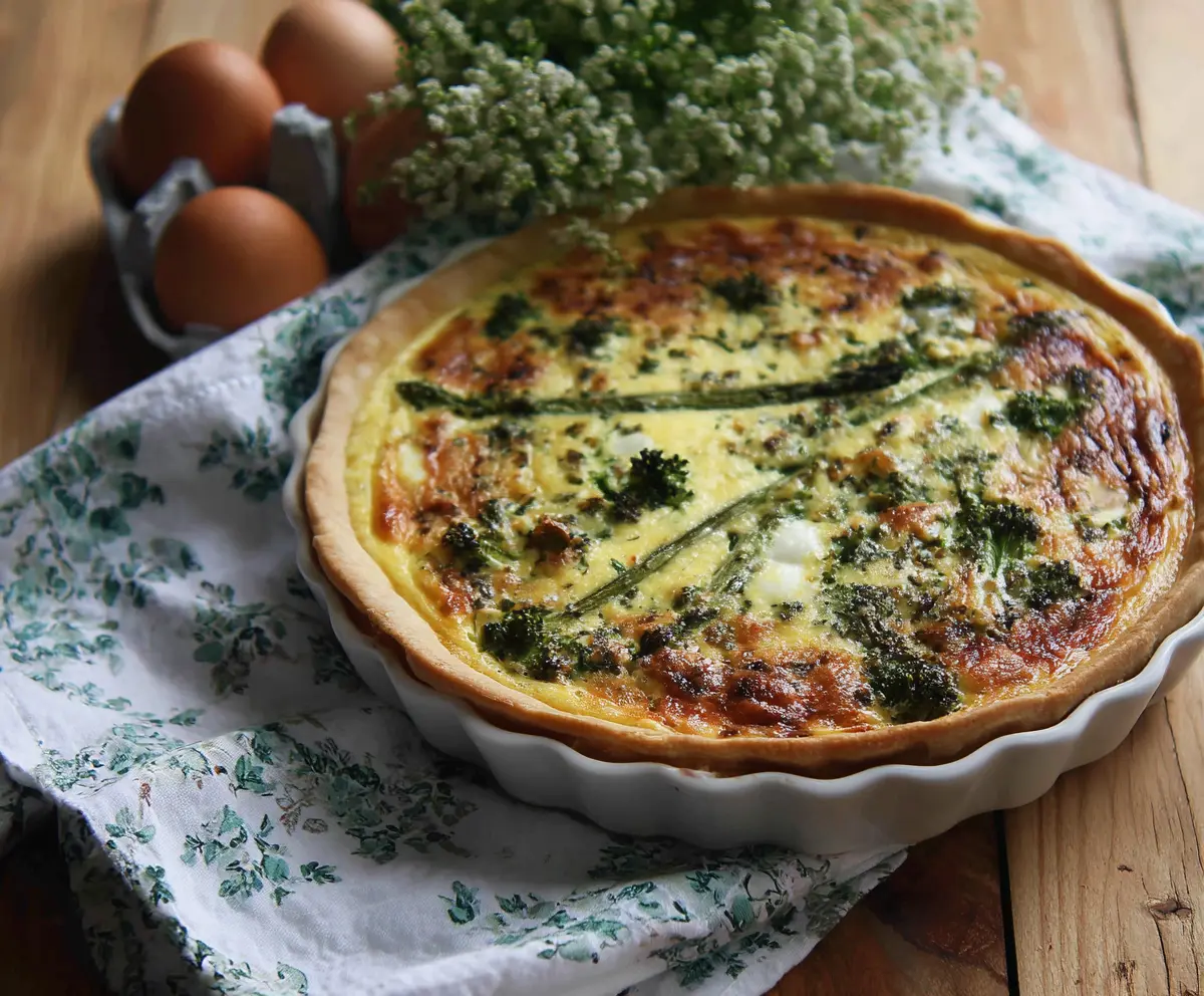 Delicious Easter brunch quiche featuring fresh vegetables and golden crust