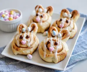 Easter Bunny Cinnamon Rolls with cute bunny shapes and colorful frosting for celebrating Easter.